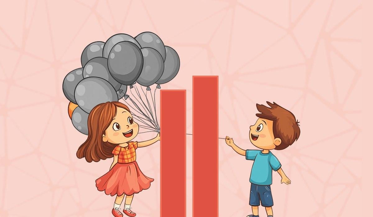 ယောက်ျားလေးသည်လိမ်မော်ရောင်ဘောလုံး / ဓာတ်ပုံရိုက်ကူးခြင်း