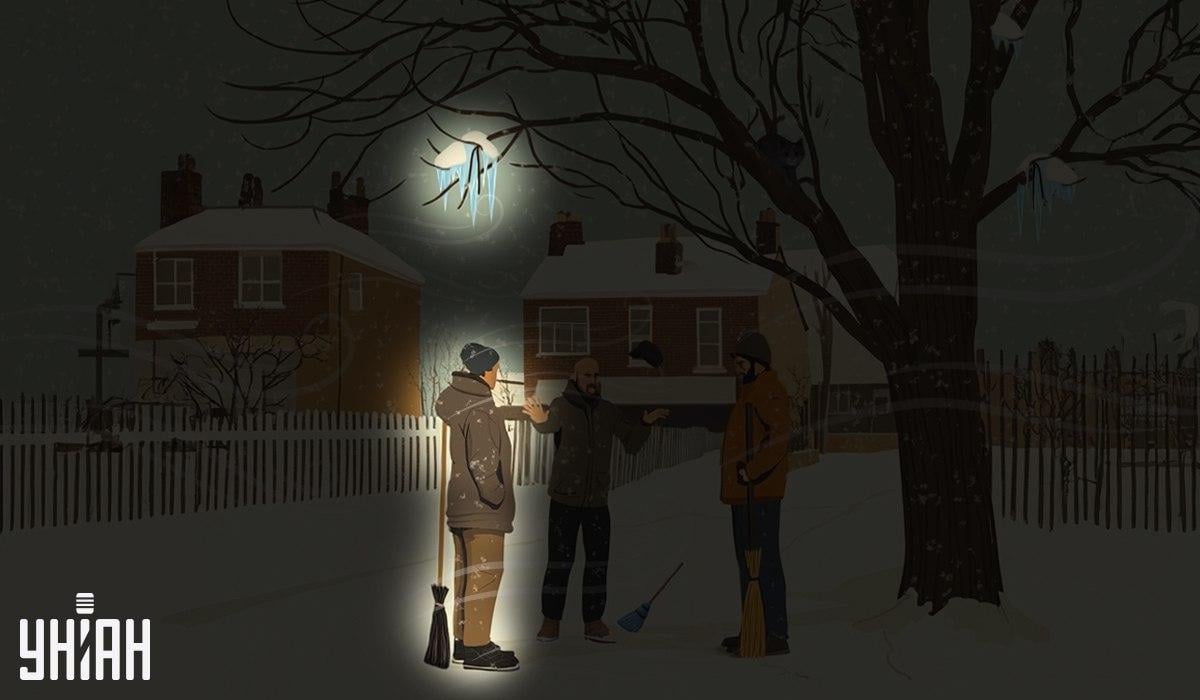 JANITTors မှတစ် ဦး သည်သစ်ပင် / ယူအက်စ်ပုံသဏ္ဌာန်တွင်ချိတ်ဆွဲထားသည့်အိုင်ဒီလွှာအောက်တွင်ရပ်နေခဲ့သည်